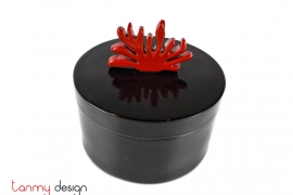 Black round box with red coral knob